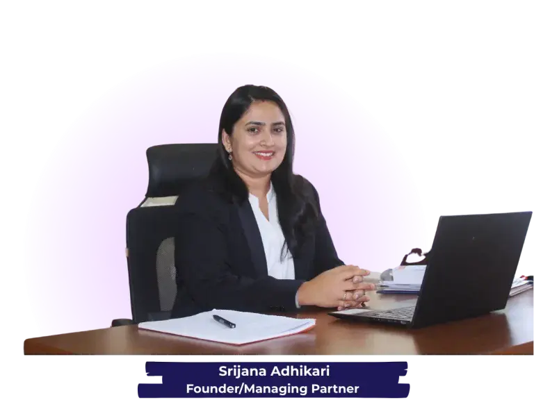 Srijana Adhikari, Founder and Managing Partner, at her desk